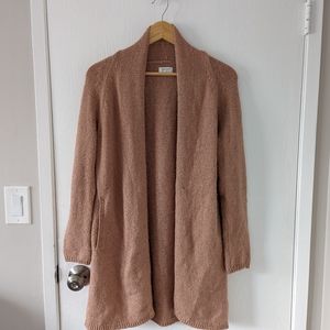 Pink community sweater